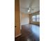 Bright bedroom featuring hard wood floors, neutral colors and a large window at 1831 Nours Landing Way, Duluth, GA 30097