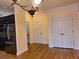 Hallway featuring closet and doorway leading into another room at 1831 Nours Landing Way, Duluth, GA 30097