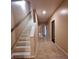 Hallway with staircase and tile flooring at 1831 Nours Landing Way, Duluth, GA 30097