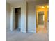 Bedroom with closet, carpet and light neutral walls provide a comforting atmosphere at 6900 Roswell Rd # 7N, Atlanta, GA 30328