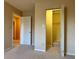 Neutral bedroom with beige walls, carpet, closet, and en-suite bathroom at 6900 Roswell Rd # 7N, Atlanta, GA 30328