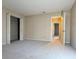 Bedroom features neutral carpet and a closet at 6900 Roswell Rd # 7N, Atlanta, GA 30328