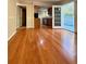 Bright and airy living room flowing into the kitchen with access to the outdoor patio through sliding doors at 6900 Roswell Rd # 7N, Atlanta, GA 30328