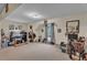 Bonus room features wall decor and carpet flooring and bright light at 8034 Bradshaw Ct, Douglasville, GA 30134