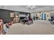 Spacious main bedroom with a tray ceiling and black accent wall at 8034 Bradshaw Ct, Douglasville, GA 30134