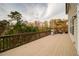 The expansive back deck features a grill and ample room for entertaining at 322 Kells Ct, Woodstock, GA 30188