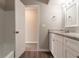 Bathroom with granite countertops, white cabinets, and tile surround at 4124 Casa Loma Dr, Decatur, GA 30034