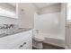 Bathroom features a new vanity with granite counters and tile surround on tub/shower at 4124 Casa Loma Dr, Decatur, GA 30034