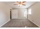 This bedroom features two windows, ceiling fan, and closet at 4124 Casa Loma Dr, Decatur, GA 30034