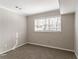 Bedroom with neutral carpet and paint and window with blinds at 4124 Casa Loma Dr, Decatur, GA 30034