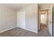 This bedroom features neutral walls, carpet flooring and a closet at 4124 Casa Loma Dr, Decatur, GA 30034