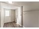 Utility room featuring wood-look floors, white door, and wire shelving at 4124 Casa Loma Dr, Decatur, GA 30034