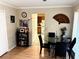 Cozy dining area with laminate floors and easy access to the kitchen at 6473 Bedford Ln, Lithonia, GA 30058