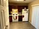 Functional kitchen featuring white appliances and ample cabinet space at 6473 Bedford Ln, Lithonia, GA 30058