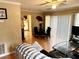 Bright and airy living room with hardwood floors, dining area and sliding door to back at 6473 Bedford Ln, Lithonia, GA 30058