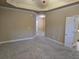Bright and airy bedroom featuring neutral walls, plush carpet, and ample open space at 2110 Retreat Haven Ln, Dacula, GA 30019