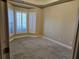 Comfortable bedroom with large windows offering natural light and plush carpeting at 2110 Retreat Haven Ln, Dacula, GA 30019