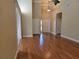 Bright foyer with hardwood floors, high ceilings and a view into other rooms at 2110 Retreat Haven Ln, Dacula, GA 30019
