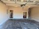 Attached garage with concrete floor and automatic door at 2110 Retreat Haven Ln, Dacula, GA 30019