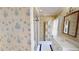 Detailed bathroom with blue and white vintage-style wallpaper, patterned tile floor, and walk-in shower at 3131 Nw Slaton Nw Dr # 24, Atlanta, GA 30305