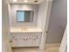 Classic bathroom featuring a white vanity, a large mirror and neutral tile flooring at 3131 Nw Slaton Nw Dr # 24, Atlanta, GA 30305