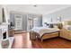Inviting bedroom with a fireplace, neutral decor, and access to a private balcony at 3131 Nw Slaton Nw Dr # 24, Atlanta, GA 30305