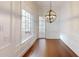 Sunlit dining room featuring hardwood floors and decorative chandelier at 3131 Nw Slaton Nw Dr # 24, Atlanta, GA 30305