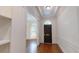 Elegant foyer with hardwood floors, crown molding, and an arched doorway at 3131 Nw Slaton Nw Dr # 24, Atlanta, GA 30305