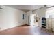 Bright, clean garage interior with ample storage space and access to outdoor spiral staircase at 3131 Nw Slaton Nw Dr # 24, Atlanta, GA 30305
