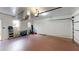 A large garage with a white door, providing secure parking and storage space at 3131 Nw Slaton Nw Dr # 24, Atlanta, GA 30305