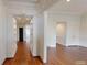 Hallway with beautiful millwork, hardwood floors, and built-in shelving providing space for decor at 3131 Nw Slaton Nw Dr # 24, Atlanta, GA 30305