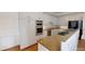 Bright kitchen with stainless steel appliances and custom white cabinets at 3131 Nw Slaton Nw Dr # 24, Atlanta, GA 30305