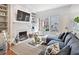 Cozy living room with built-in bookshelves, fireplace, and sliding doors to the outside at 3131 Nw Slaton Nw Dr # 24, Atlanta, GA 30305