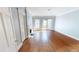 Spacious living room with hardwood floors, fireplace, and glass doors at 3131 Nw Slaton Nw Dr # 24, Atlanta, GA 30305