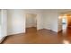 Bright living room showcasing hardwood floors, neutral walls with detailed trim, and an open floor plan at 3131 Nw Slaton Nw Dr # 24, Atlanta, GA 30305