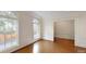 Sunlit living room with hardwood floors, large windows, and decorative molding at 3131 Nw Slaton Nw Dr # 24, Atlanta, GA 30305