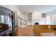 Bright living room with fireplace, built-in bookcases and access to the staircase at 3131 Nw Slaton Nw Dr # 24, Atlanta, GA 30305