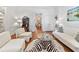 Bright and airy living room features hardwood floors, a decorative rug, and classic furnishings at 3131 Nw Slaton Nw Dr # 24, Atlanta, GA 30305