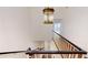 Staircase with dark railing, white balusters and chandelier at 3131 Nw Slaton Nw Dr # 24, Atlanta, GA 30305