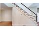 Detailed view of the home's staircase with dark railings and white trim at 3131 Nw Slaton Nw Dr # 24, Atlanta, GA 30305