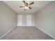 Spacious bedroom with plush carpeting and ample closet space at 821 Stonebridge Park Cir, Lithonia, GA 30058