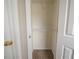 Open closet with shelves and carpeted floor at 821 Stonebridge Park Cir, Lithonia, GA 30058