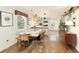 Dining area with hardwood floors connecting to the kitchen, perfect for entertaining guests at 1840 Se Terry Mill Se Rd, Atlanta, GA 30316