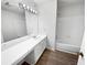 Bathroom boasts extended vanity, ample storage and tile flooring at 17 Matawan Se Cir, Smyrna, GA 30080