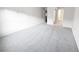 Large bedroom with neutral carpeting and access to the hall and bath at 17 Matawan Se Cir, Smyrna, GA 30080