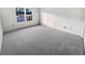 Spacious bedroom with neutral paint, soft carpeting and great natural light at 17 Matawan Se Cir, Smyrna, GA 30080