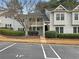 Charming condominium with neutral siding, groomed landscaping, and convenient parking spaces at 17 Matawan Se Cir, Smyrna, GA 30080
