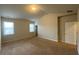 Neutral bedroom with carpet, a window for natural light, and ample space at 5223 Catrina Way, Buford, GA 30519