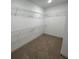 Walk-in closet featuring carpeted floors and metal shelving at 117 Legends Way, Hiram, GA 30141
