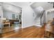 Bright foyer with hardwood floors flows into the living room and staircase to the second level at 2832 Old Villa Rica Rd, Powder Springs, GA 30127